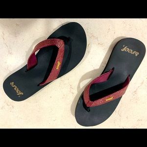 Reef Flip Flops size 9 but fits like 8.5.  Black sandals pink/purple straps.